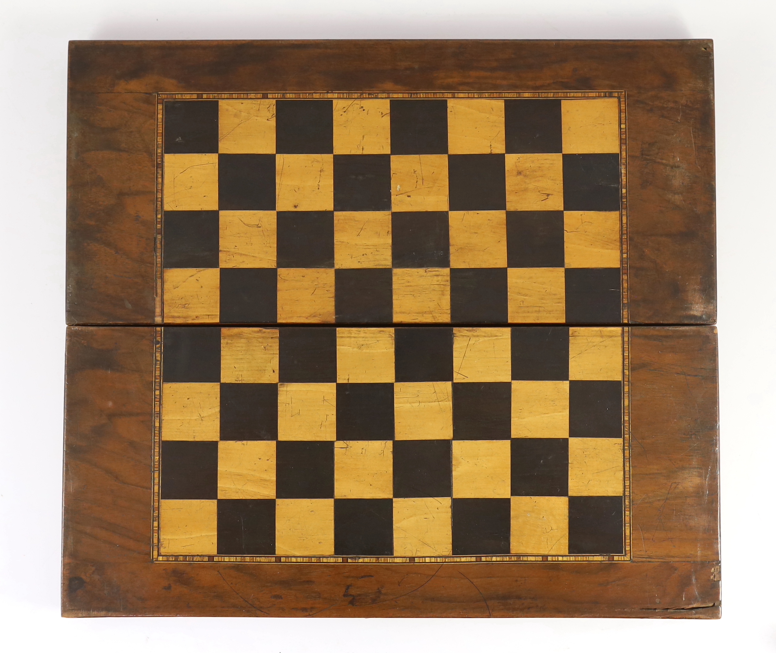 A Jacques ebony and boxwood Staunton pattern chess set, 44 x 39cm when open